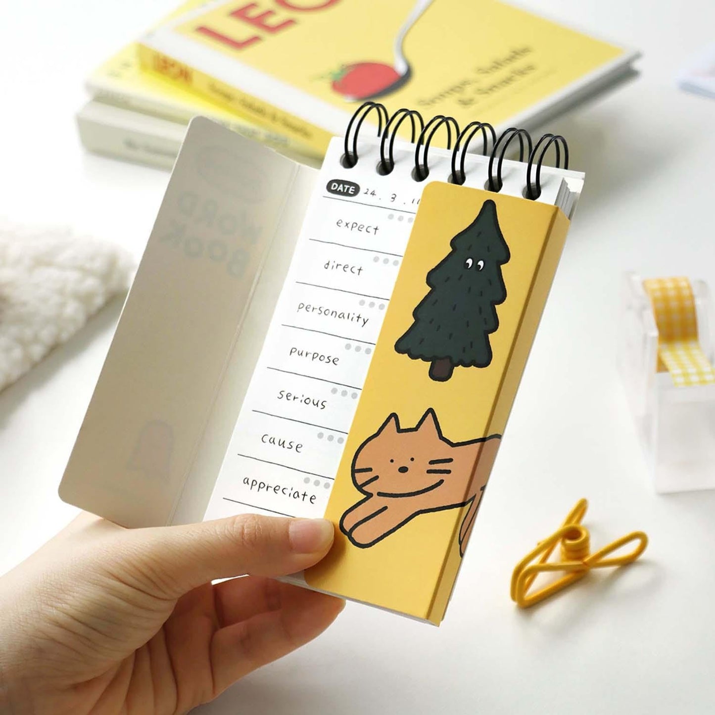 doodle word book yellow iconic cat and tree