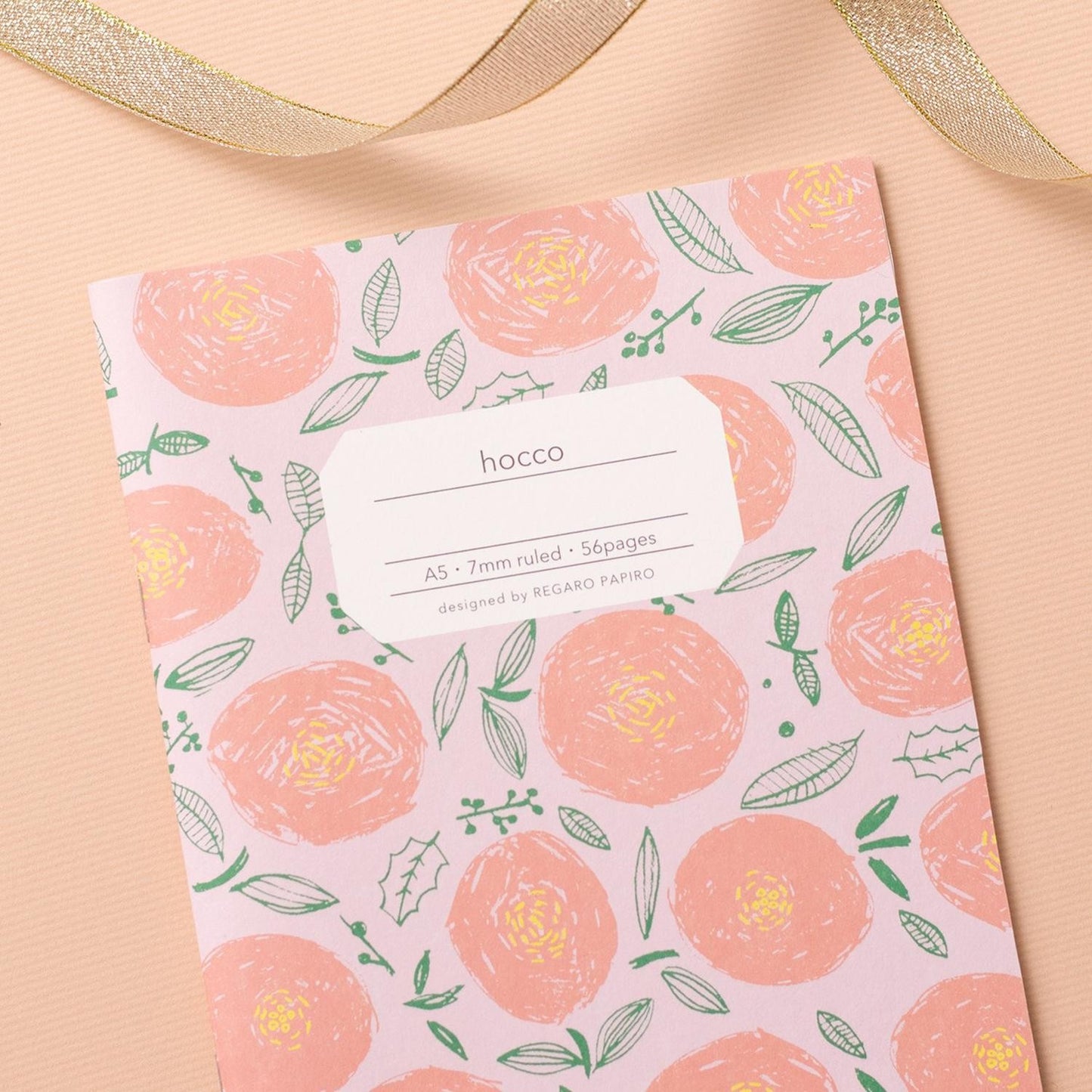 notebook detail floral circular shaped pink color and pink background
